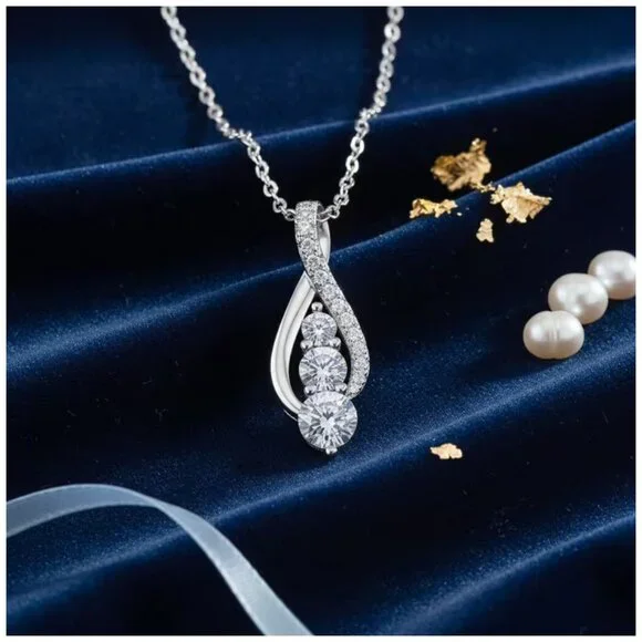 Necklace Infinity-Inspired Twist Pendant with a Cascade of Round-Cut Stones - Picture 1 of 4